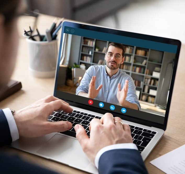 Back,View,Of,Businessman,Talk,With,Male,Business,Partner,Using Back,View,Of,Businessman,Talk,With,Male,Business,Partner,Using